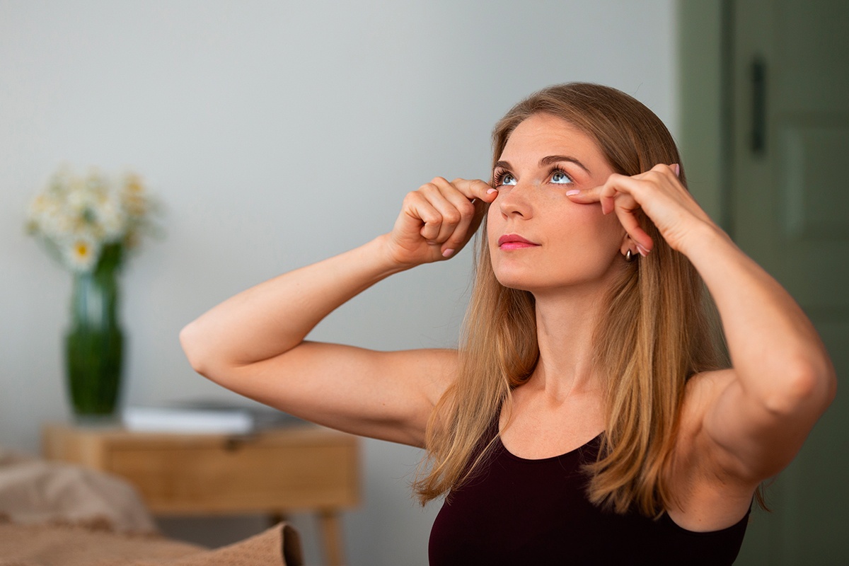 side-view-woman-practicing-facial-yoga